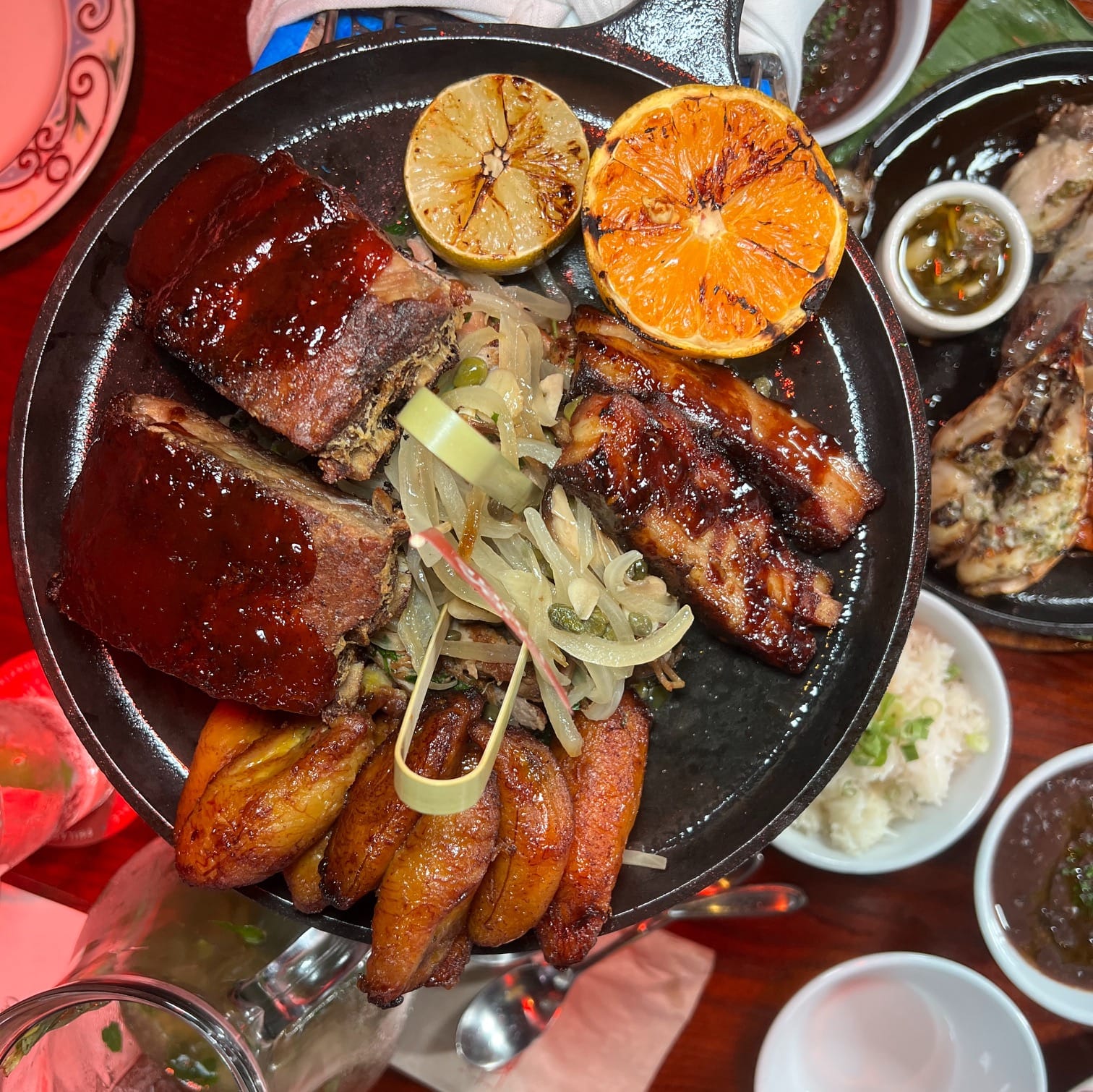 An image of Cuba Libre's Pork Feast, with pork and fried plantains