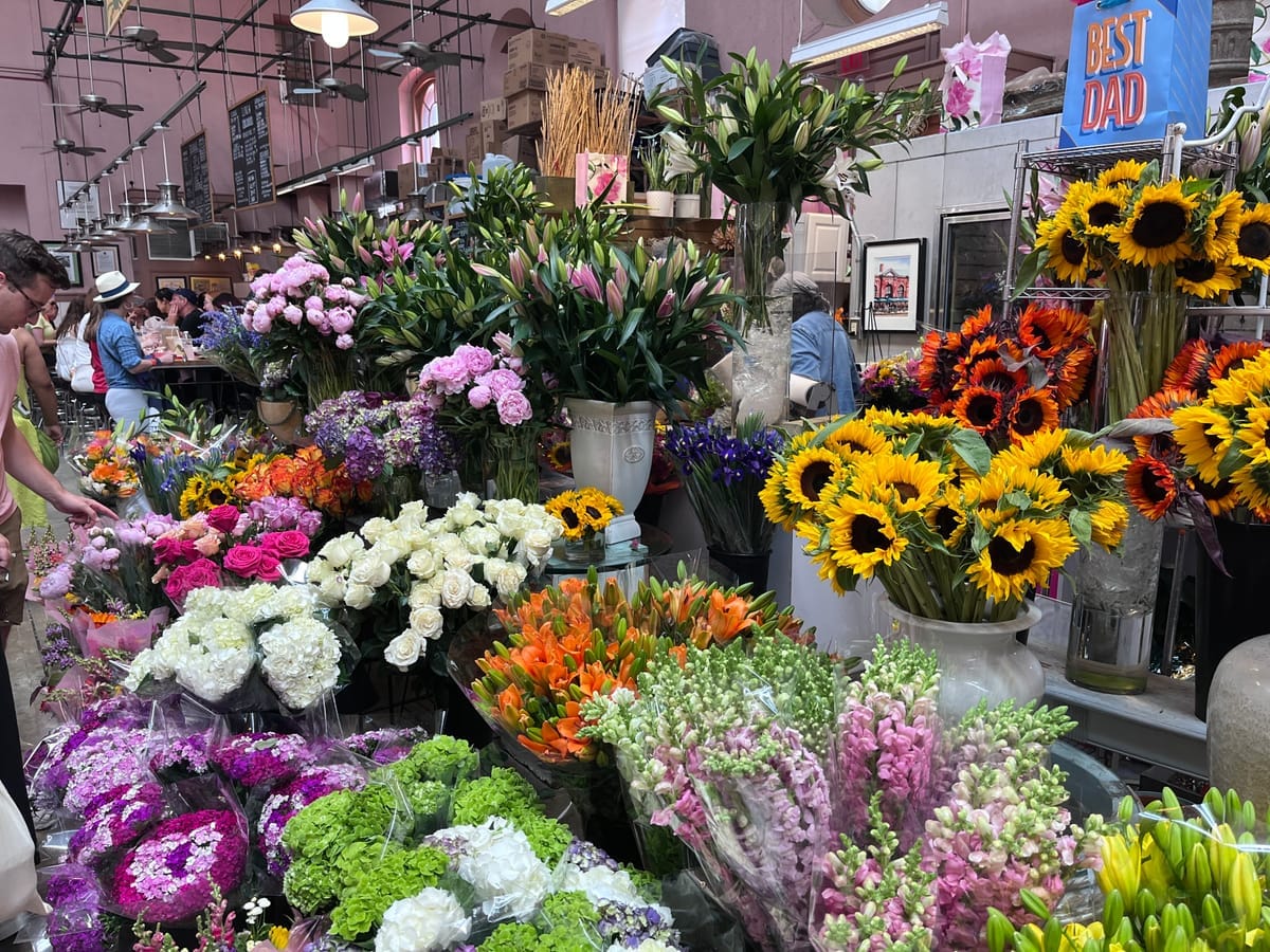 A large display of flowers for sale at Eastern Market