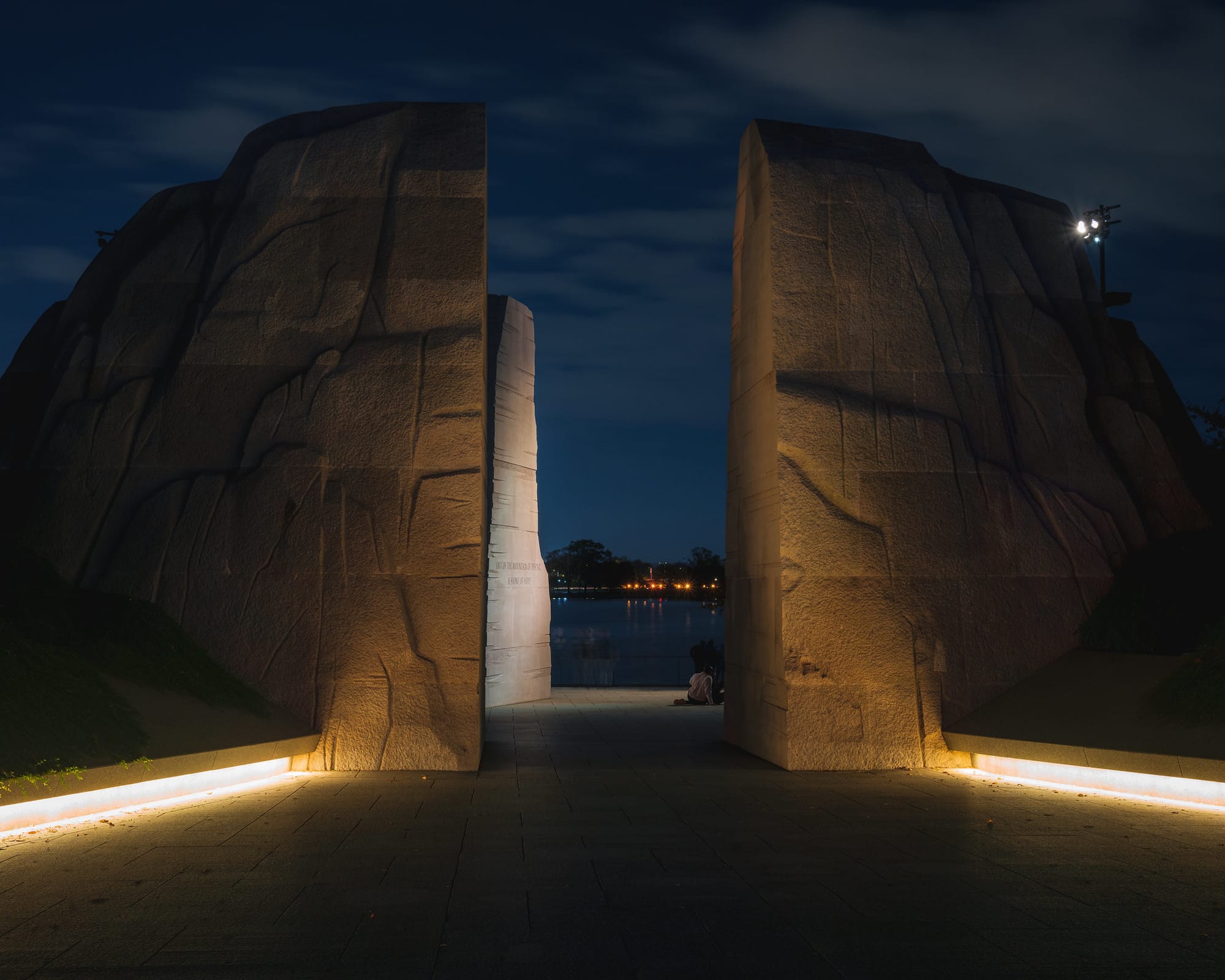The MLK Jr. Memorial lit up at night.