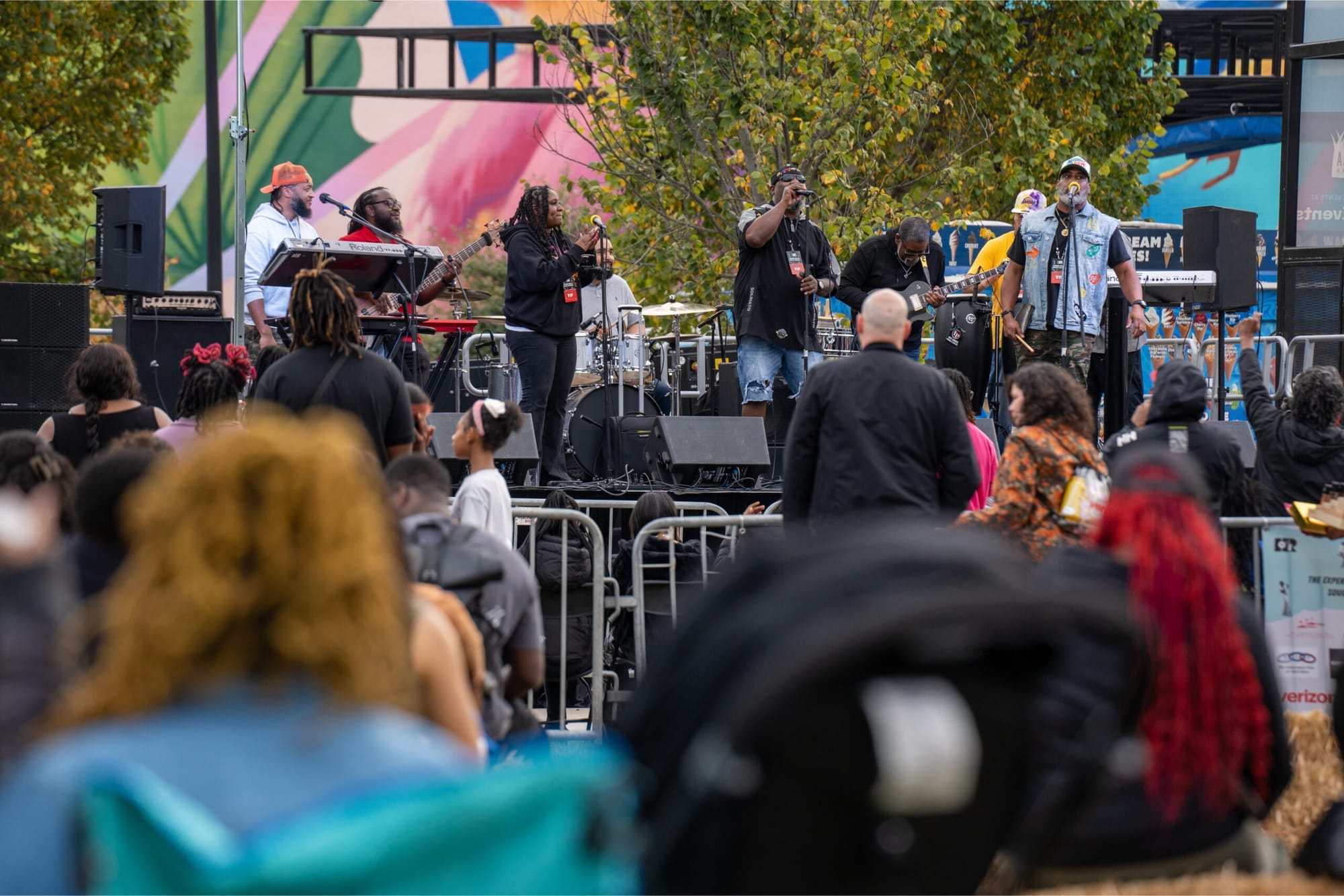 Eight musicians performing on stage at The Home Rule Music Festival