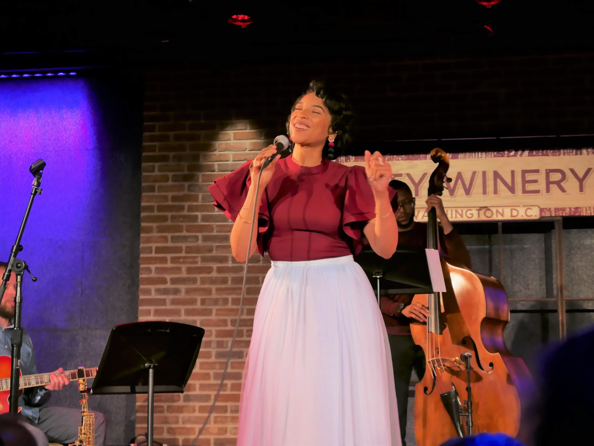 Photo showing Imani Grace-Cooper performing with other musicians at City Winery in Washington, DC