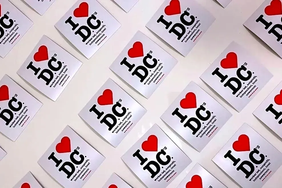 Rows and rows of 51st stickers that say I heart DC's worker-led, nonprofit, independent, local newsroom,