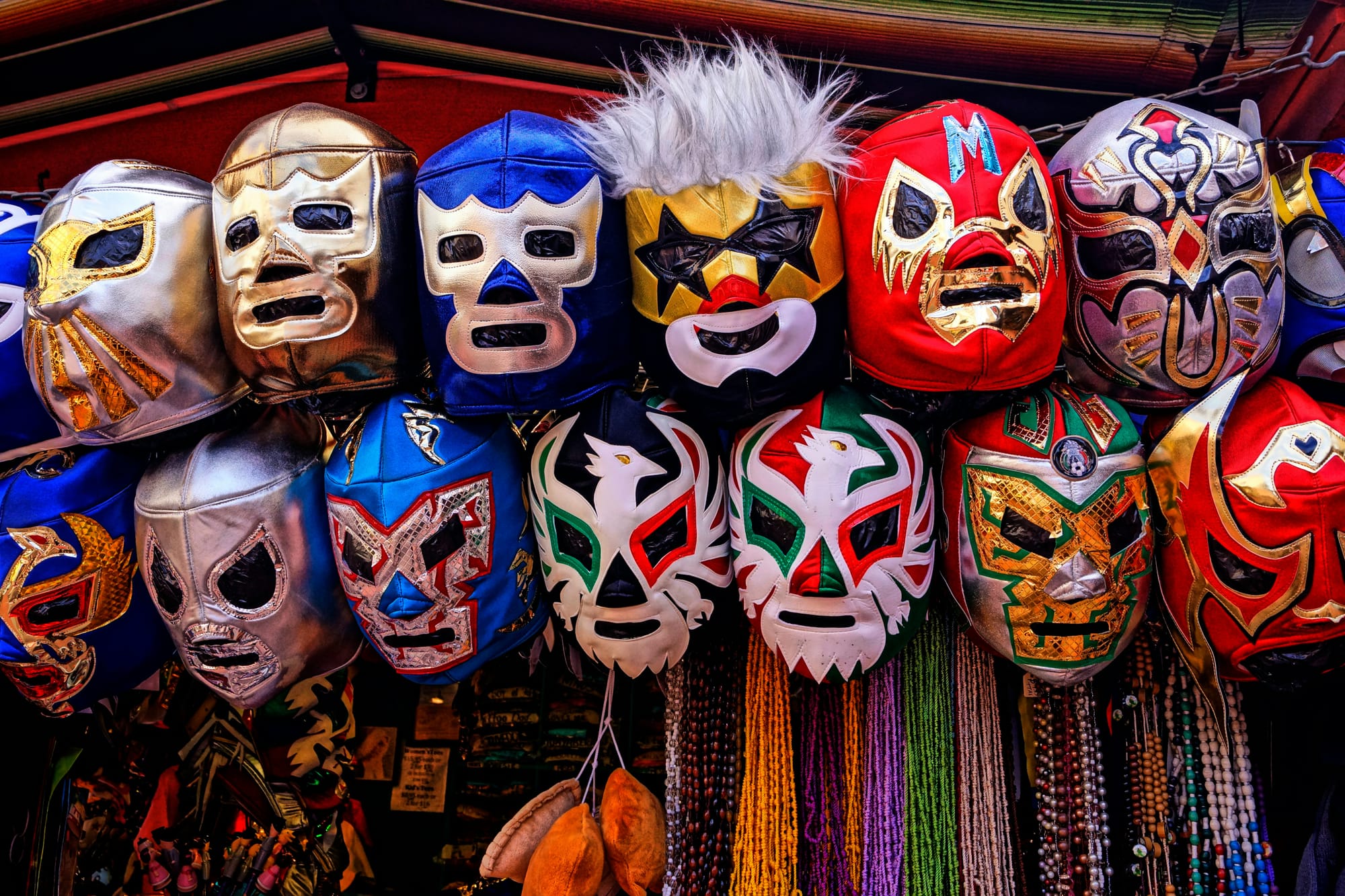 A colorful display of Mexican wrestling masks.