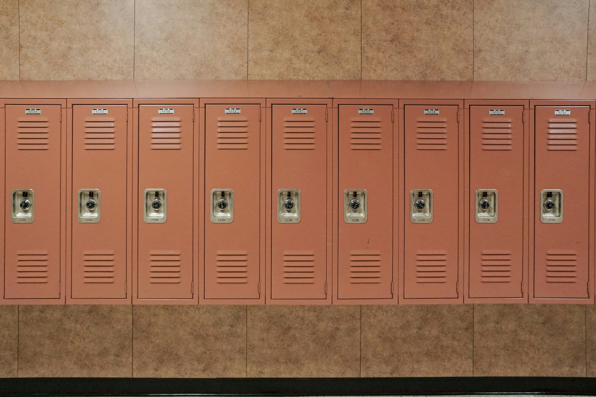 An image of a row of closed lockers.