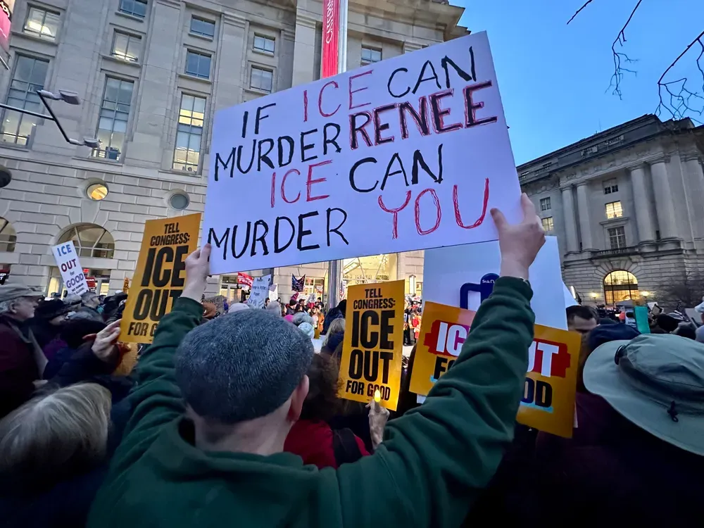 A sign at a protest that reads "If ICE can murder Renee ICE can murder you." 