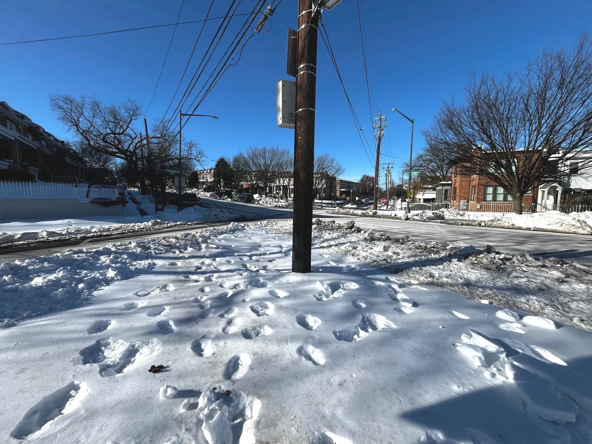 Image of snow- and ice-covered roadway in D.C.