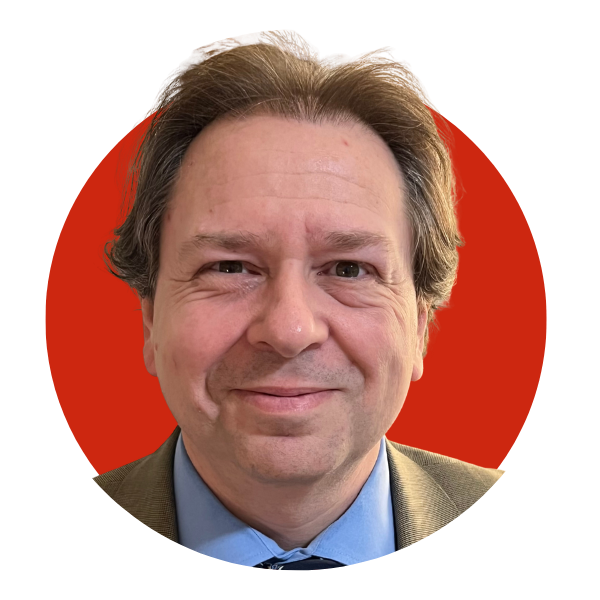 A portrait of David Downey against a red background. 