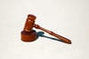 a photo of a gavel against a white background