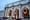 Photo of Union Station in DC with three large, lit wreaths hanging. 