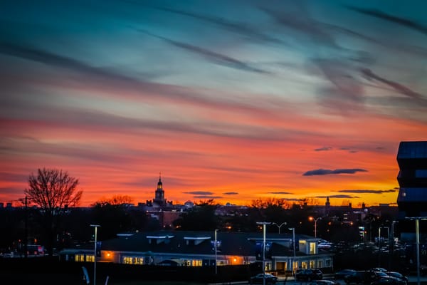 A photograph of a sunset over Howard University.