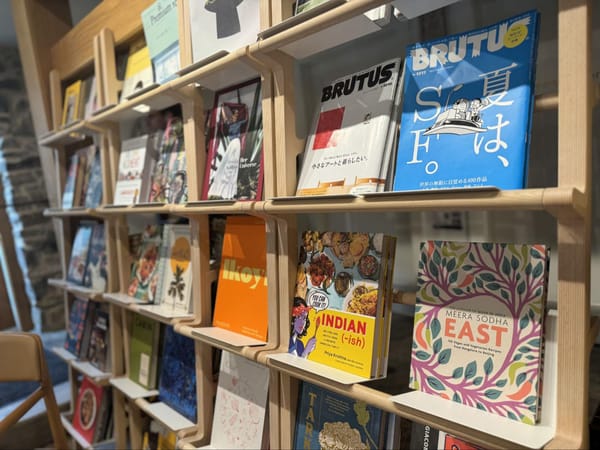  A color display of books on a shelf in a store. 