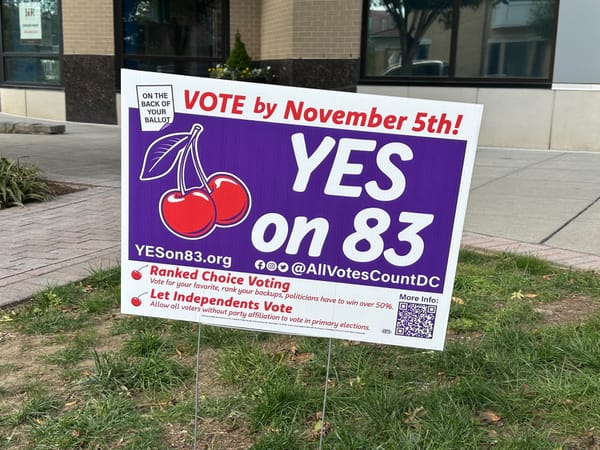 A political campaign reads YES ON 83! in white text over a blue background. 