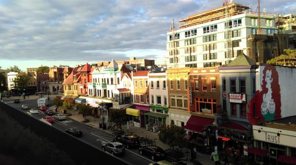 Sunlight hits a row of buildings on 18th St in Adams Morgan. 